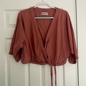 Mauve/pink crop top with adjustable tie. Very flattering!